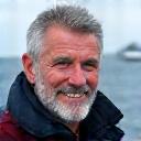 Portrait of Captain Alistair Morrison, a grizzled but friendly commercial fishing captain.